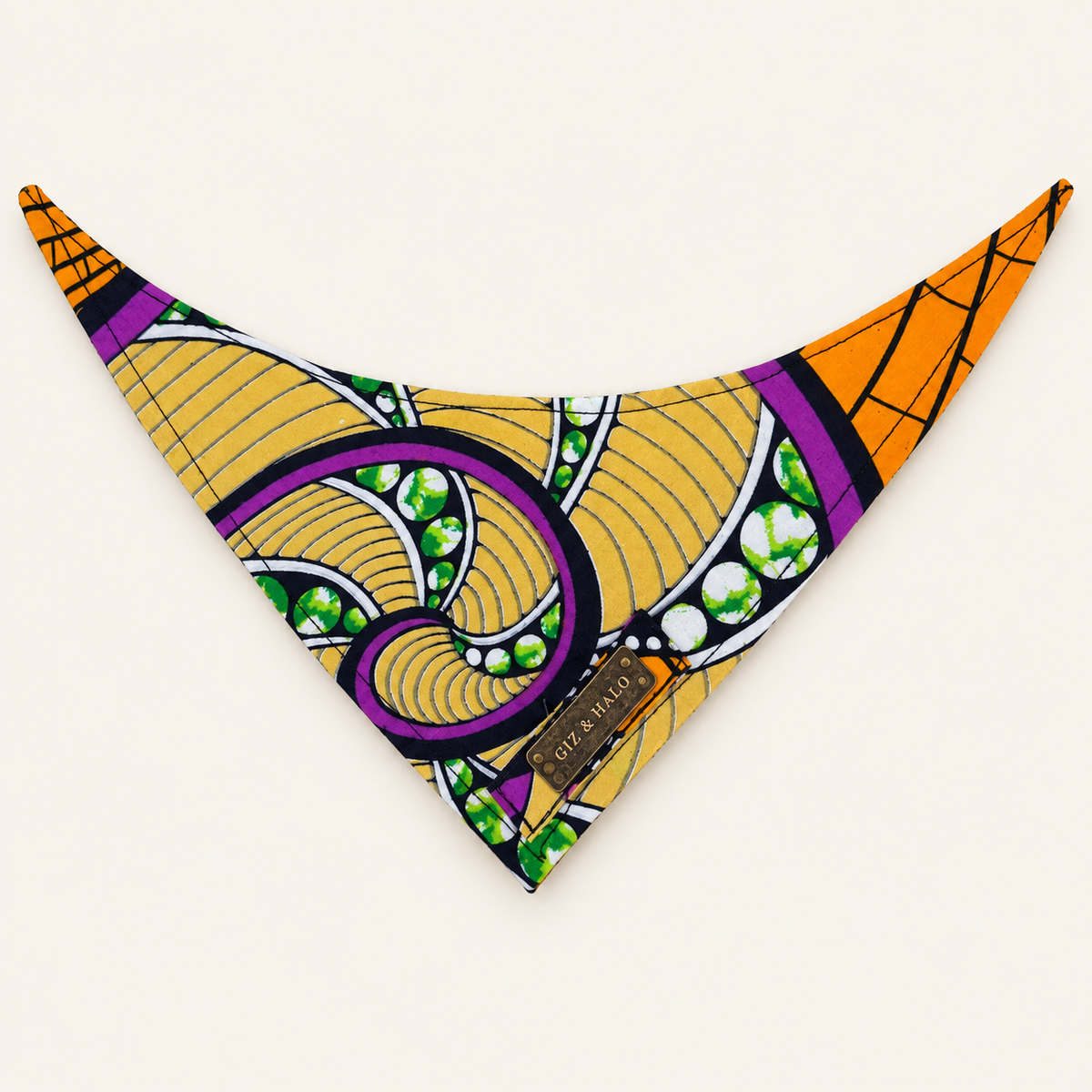 Giz & Halo Golden Swirl dog bandana on an ivory background